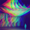 digitales Bild mit einer Decke in leuchtenden Farben, darunter eine Person